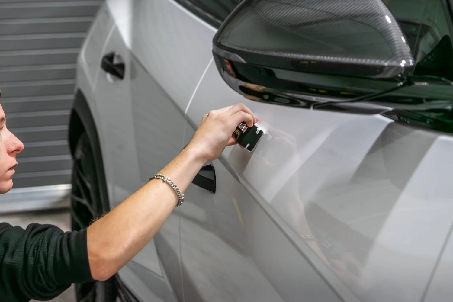 Coating being levelled on a freshly polished panel
